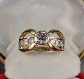 DIAMOND AND FOURTEEN KARAT GOL