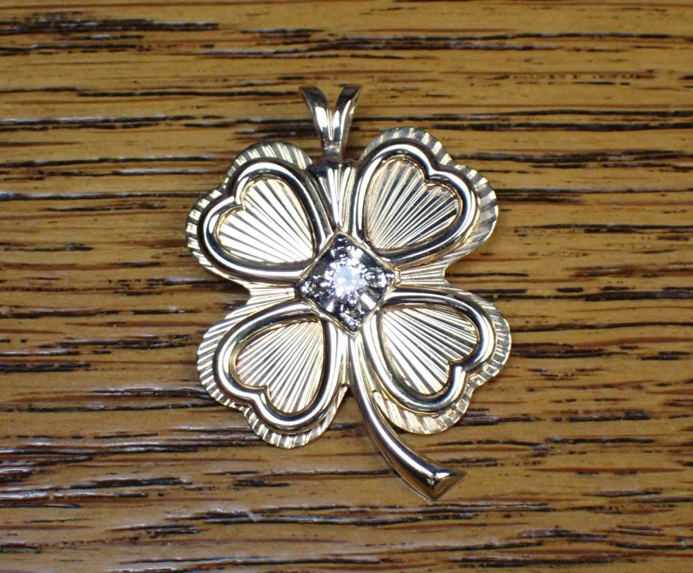 DIAMOND AND FOURTEEN KARAT GOLD