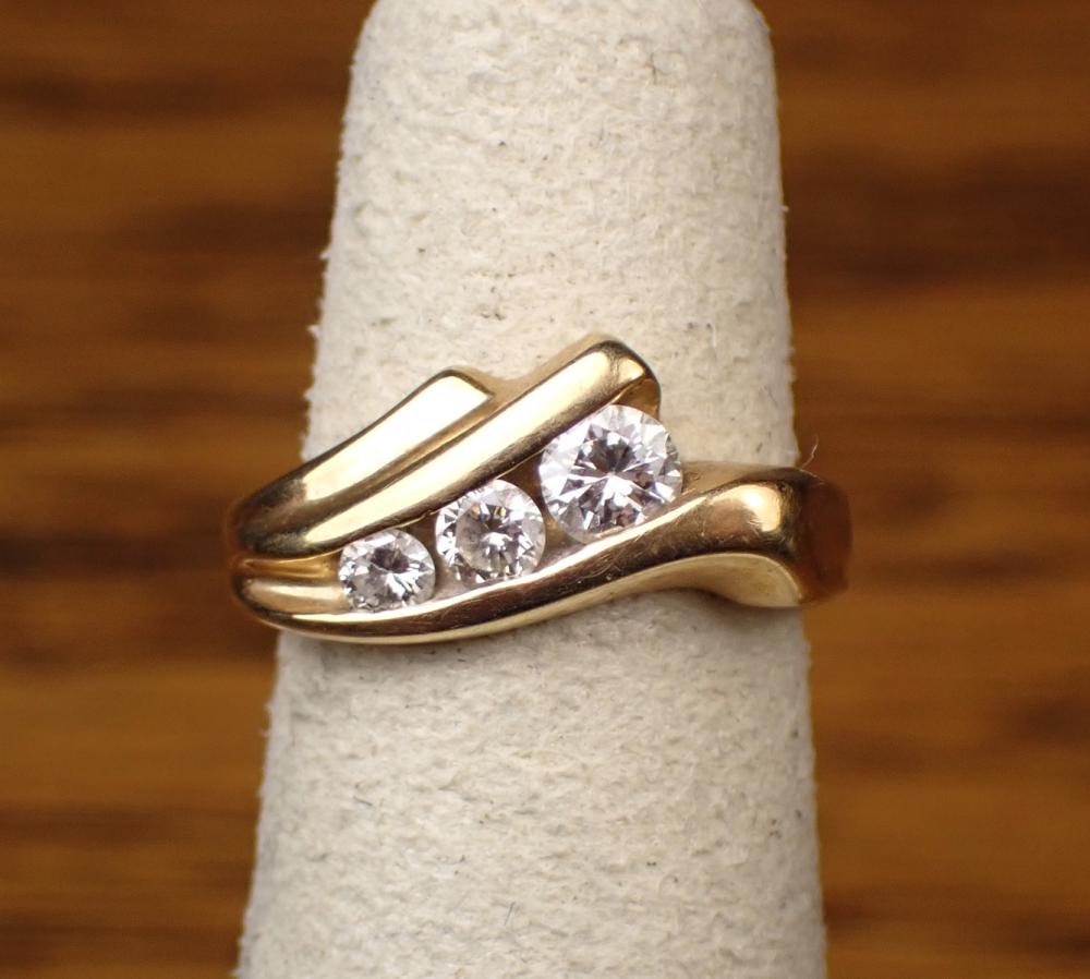 DIAMOND AND FOURTEEN KARAT GOLD