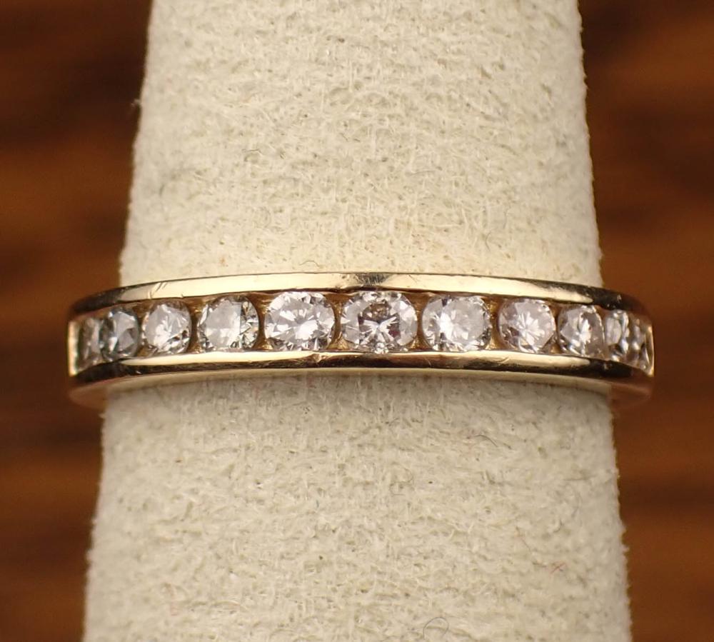 DIAMOND AND FOURTEEN KARAT GOLD