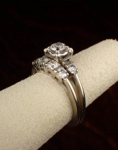 DIAMOND AND FOURTEEN KARAT GOL