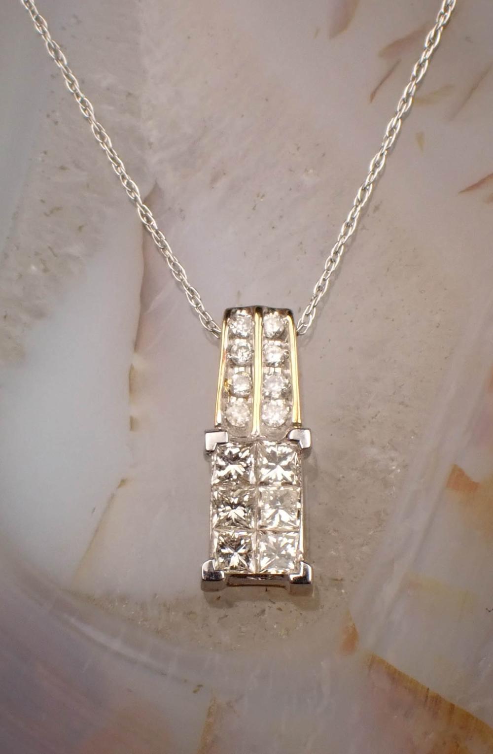 DIAMOND AND FOURTEEN KARAT GOLD