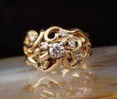 DIAMOND AND FOURTEEN KARAT GOL