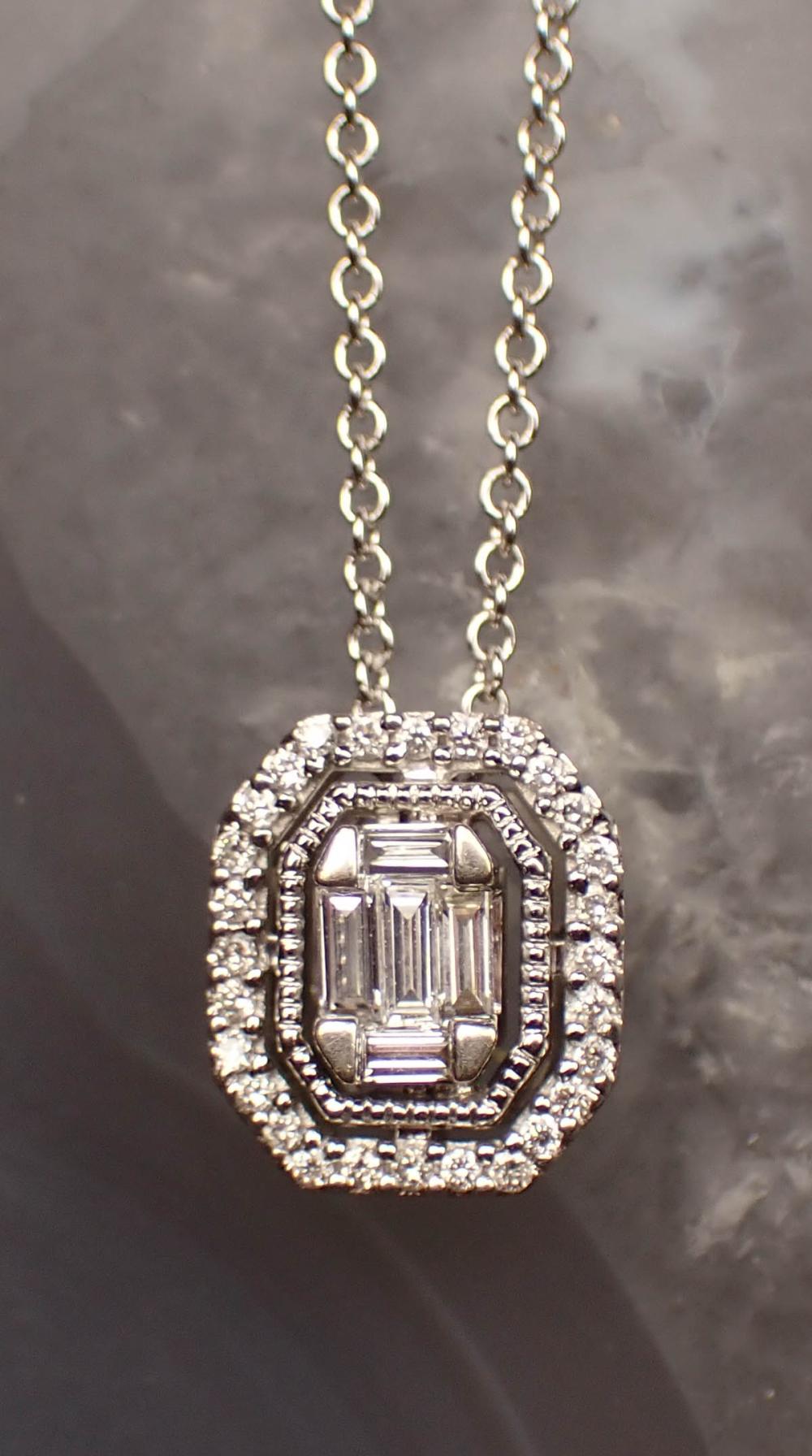 DIAMOND AND FOURTEEN KARAT GOLD