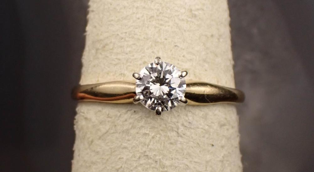 DIAMOND AND FOURTEEN KARAT GOLD