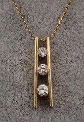 DIAMOND AND FOURTEEN KARAT GOL