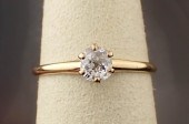 DIAMOND AND FOURTEEN KARAT SOL