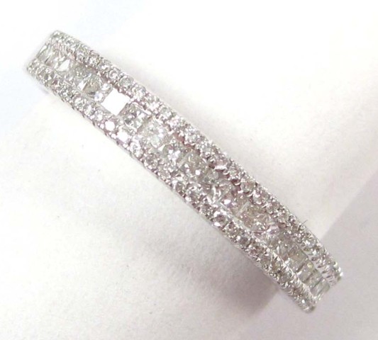 DIAMOND AND FOURTEEN KARAT WHITE