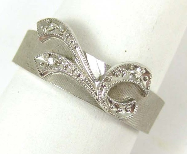 DIAMOND AND FOURTEEN KARAT WHITE