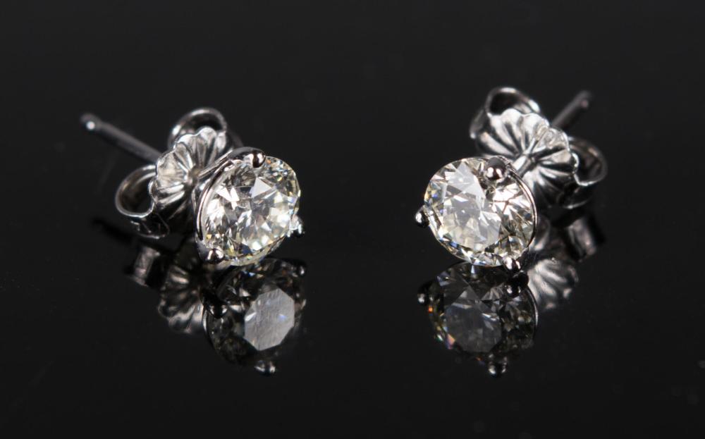 DIAMOND AND FOURTEEN KARAT WHITE