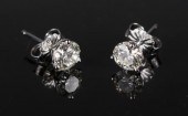 DIAMOND AND FOURTEEN KARAT WHI