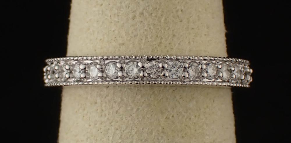 DIAMOND AND FOURTEEN KARAT WHITE