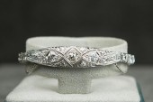 DIAMOND AND FOURTEEN KARAT WHI