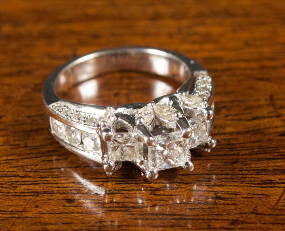DIAMOND AND FOURTEEN KARAT WHITE