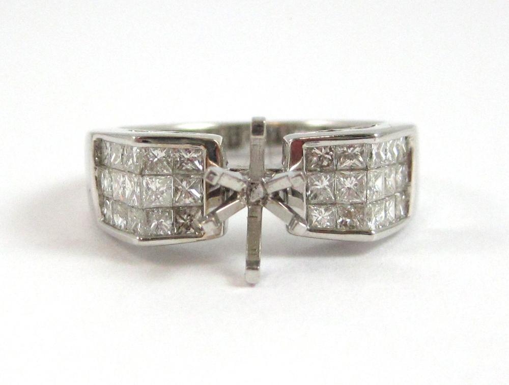 DIAMOND AND FOURTEEN KARAT WHITE