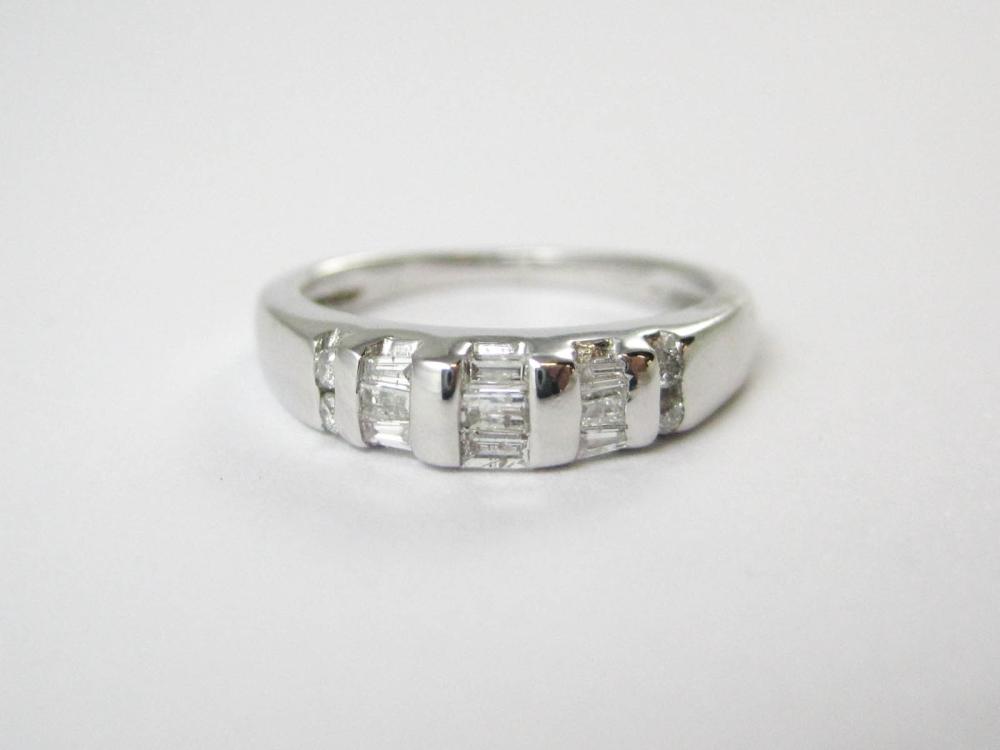 DIAMOND AND FOURTEEN KARAT WHITE