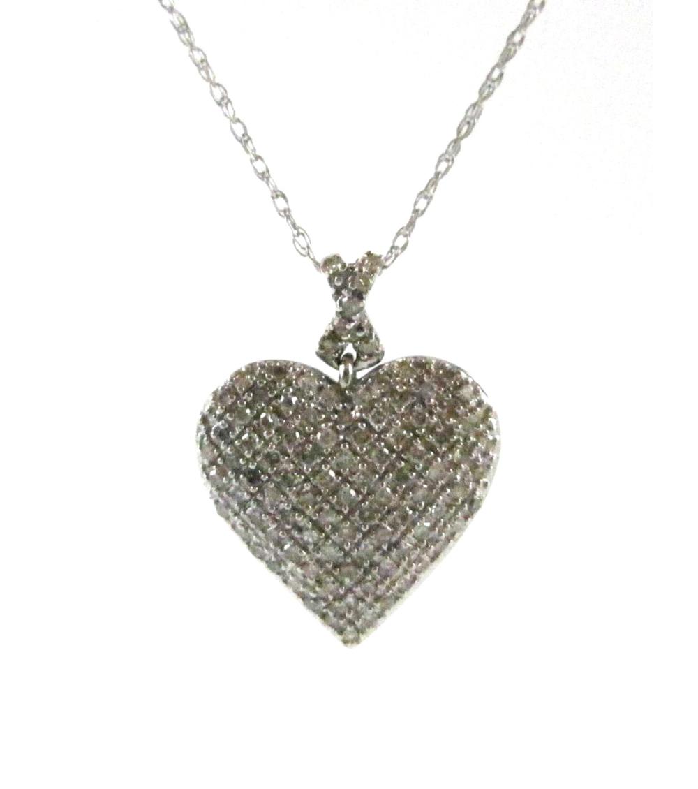 DIAMOND AND FOURTEEN KARAT WHITE