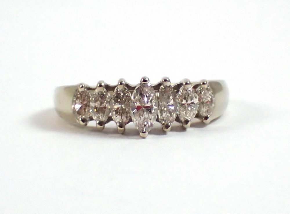 DIAMOND AND FOURTEEN KARAT WHITE