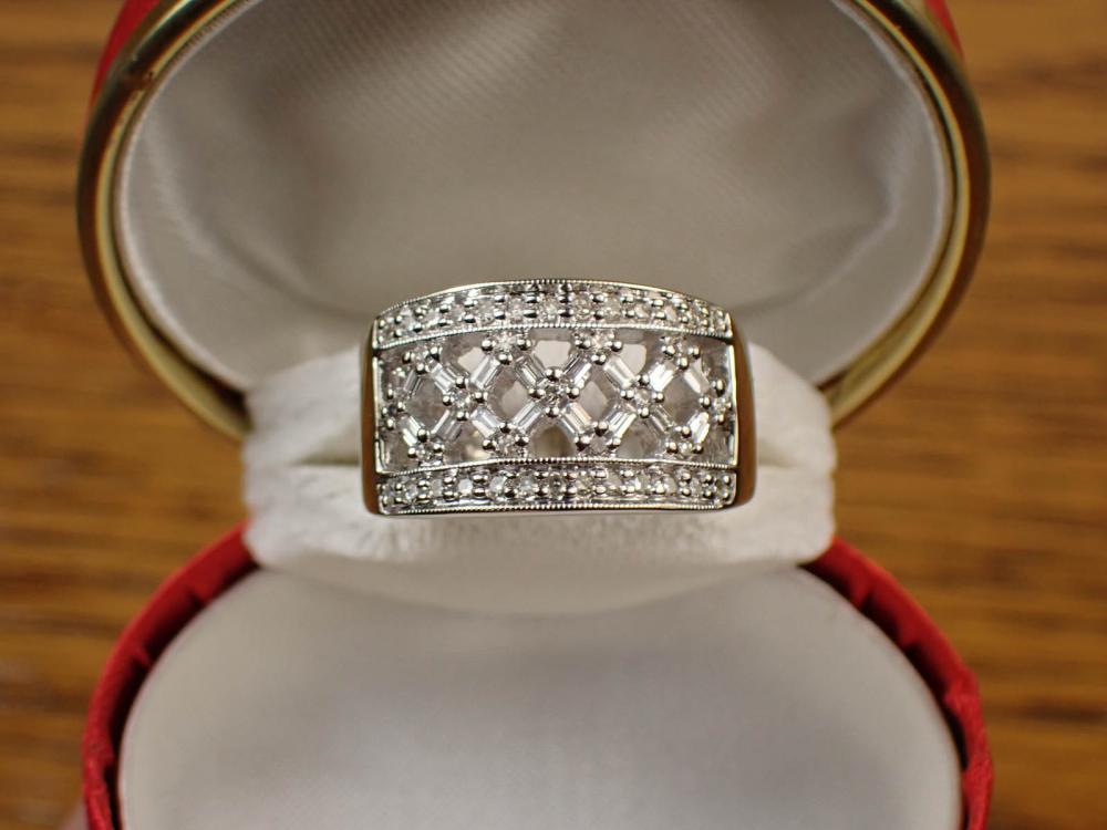 DIAMOND AND FOURTEEN KARAT WHITE