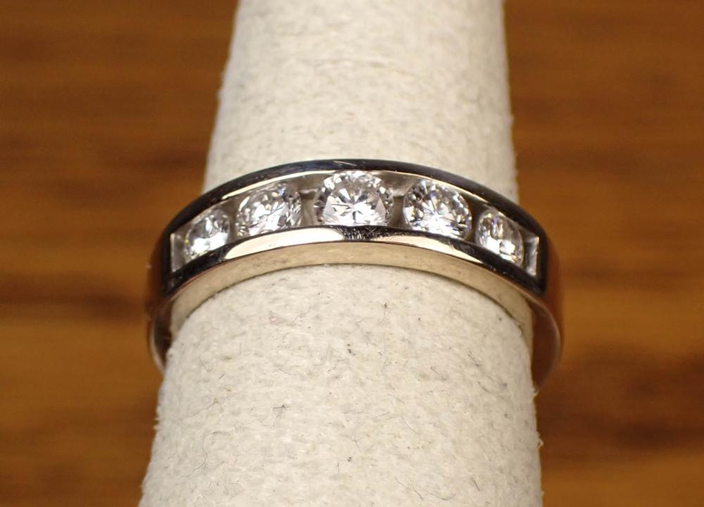 DIAMOND AND FOURTEEN KARAT WHITE