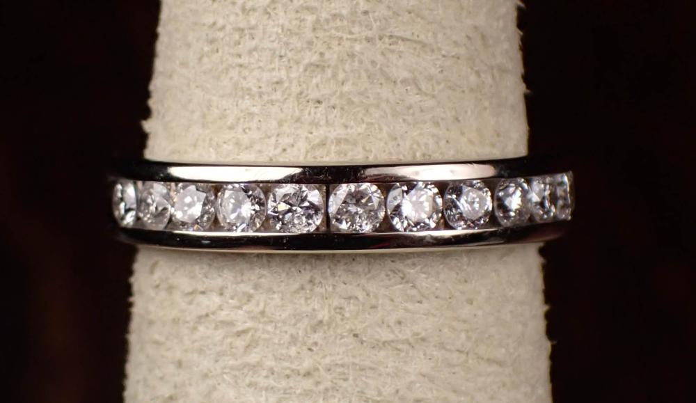 DIAMOND AND FOURTEEN KARAT WHITE