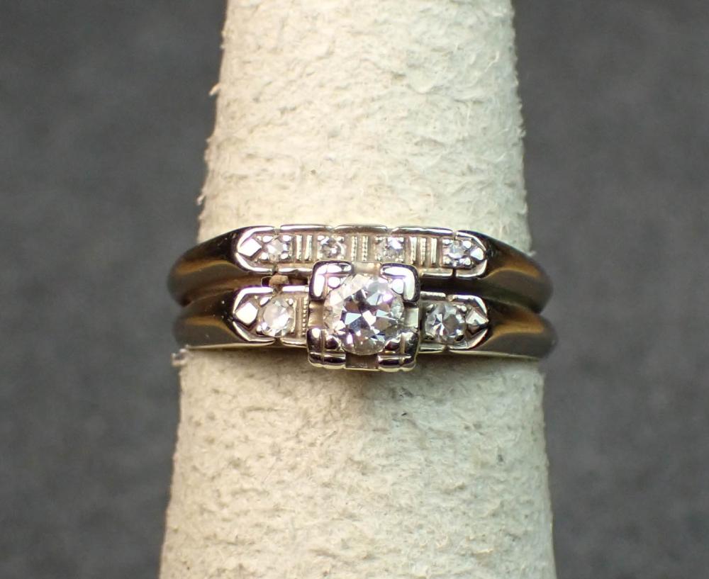DIAMOND AND FOURTEEN KARAT WHITE
