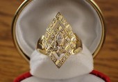 DIAMOND AND NINETEEN KARAT GOL