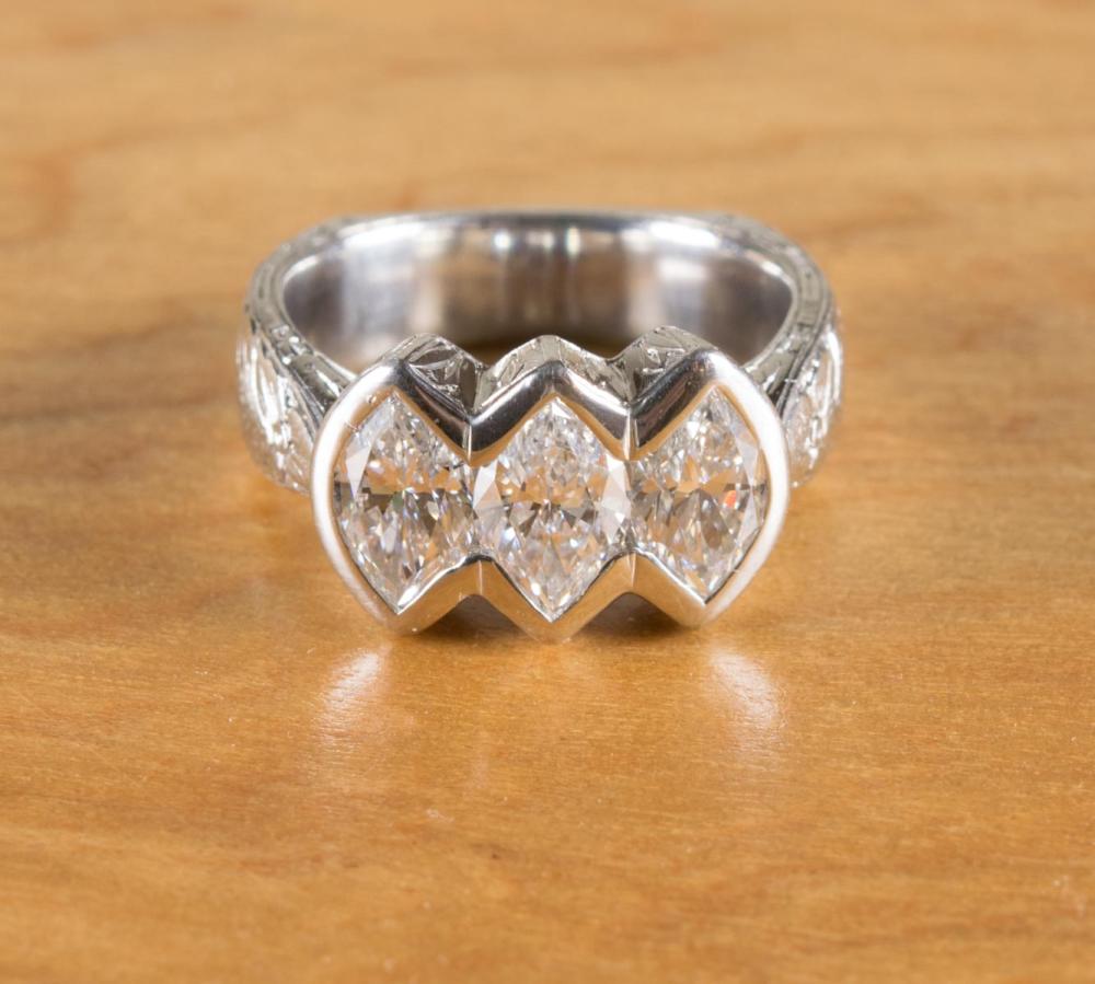 DIAMOND AND PLATINUM THREE-STONE