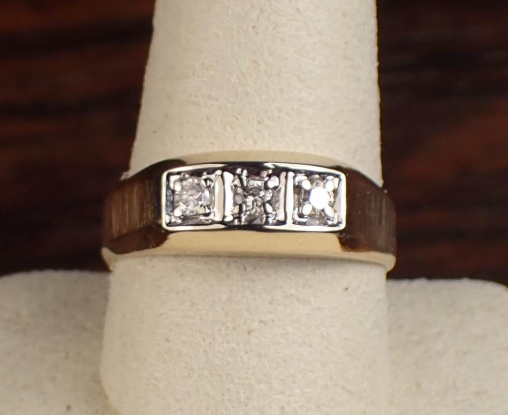 DIAMOND AND TEN KARAT GOLD MANS