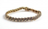 DIAMOND AND TWO-TONE GOLD BRAC