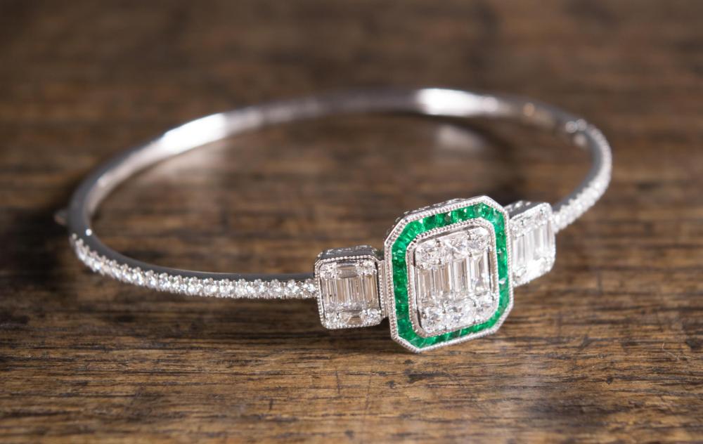 DIAMOND, EMERALD AND EIGHTEEN KARAT