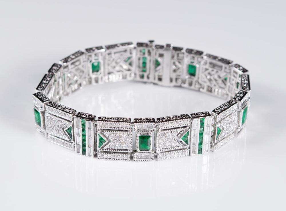 DIAMOND, EMERALD AND FOURTEEN KARAT