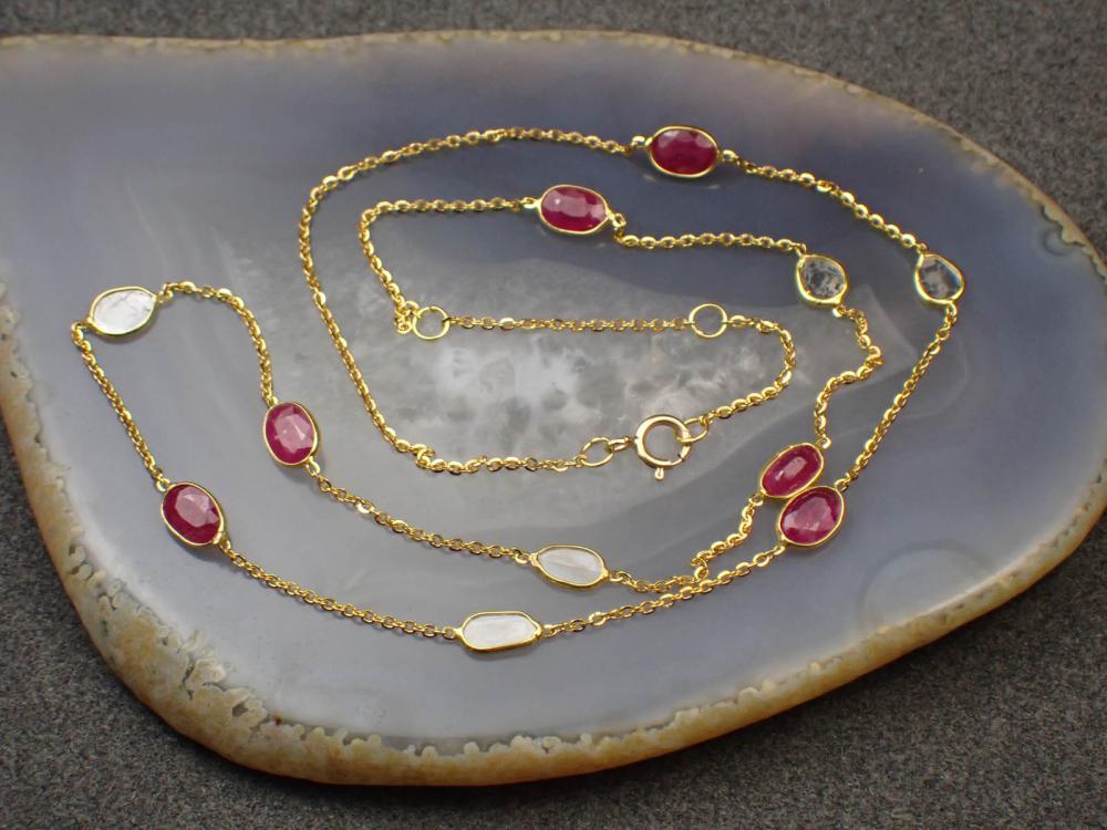 DIAMOND, RUBY AND EIGHTEEN KARAT