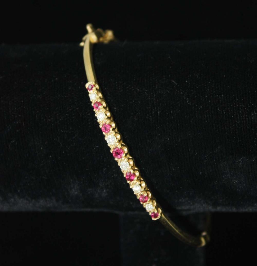 DIAMOND, RUBY AND FOURTEEN KARAT