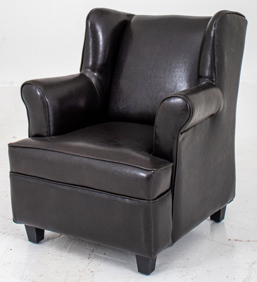 DIMINUTIVE LEATHER UPHOLSTERED
