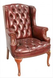 DIMINUTIVE LEATHER UPHOLSTERY