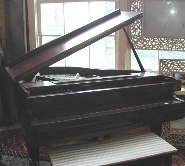Diminutive Mahogany Baby Grand