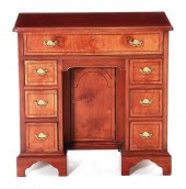 Diminutive mahogany kneehole d