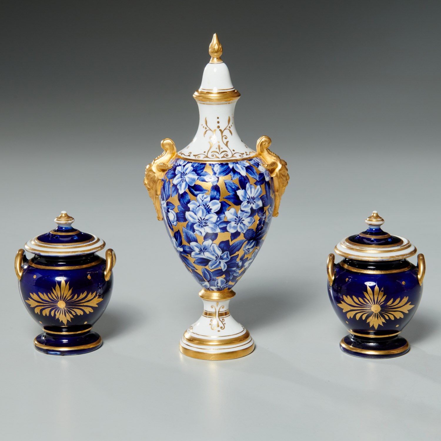 DIMINUTIVE PORCELAIN URN & PAIR