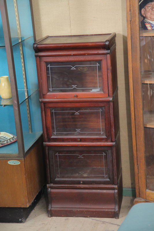 DIMINUTIVE STACKED BOOKCASE.