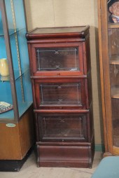DIMINUTIVE STACKED BOOKCASE. M