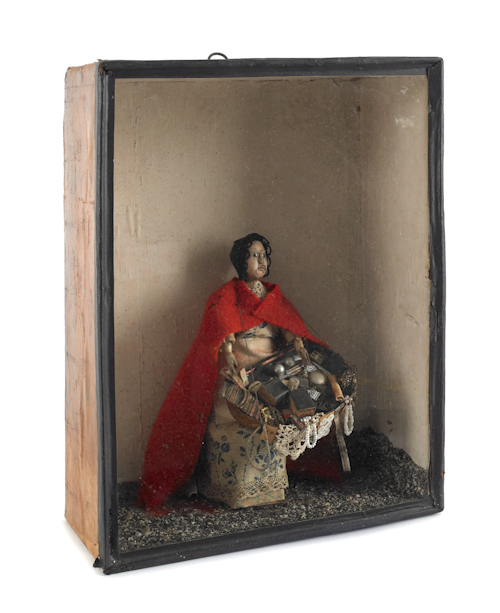 Diorama of a peddler woman