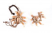 DOGS' TEETH PENDANTSTwo decora