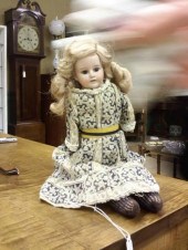 DOLL. Bisque head and hands  g