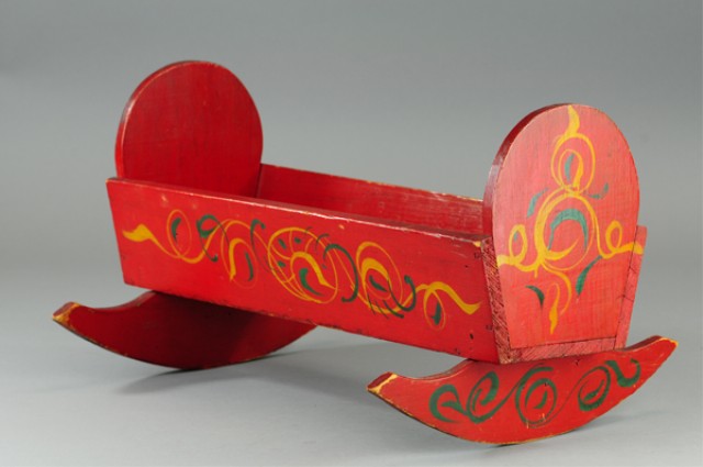 DOLL SIZED CRADLE Made of wood