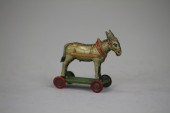DONKEY ON PLATFORM PENNY TOY M