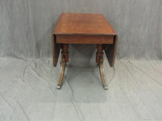 Double Pedestal Drop Leaf Table.