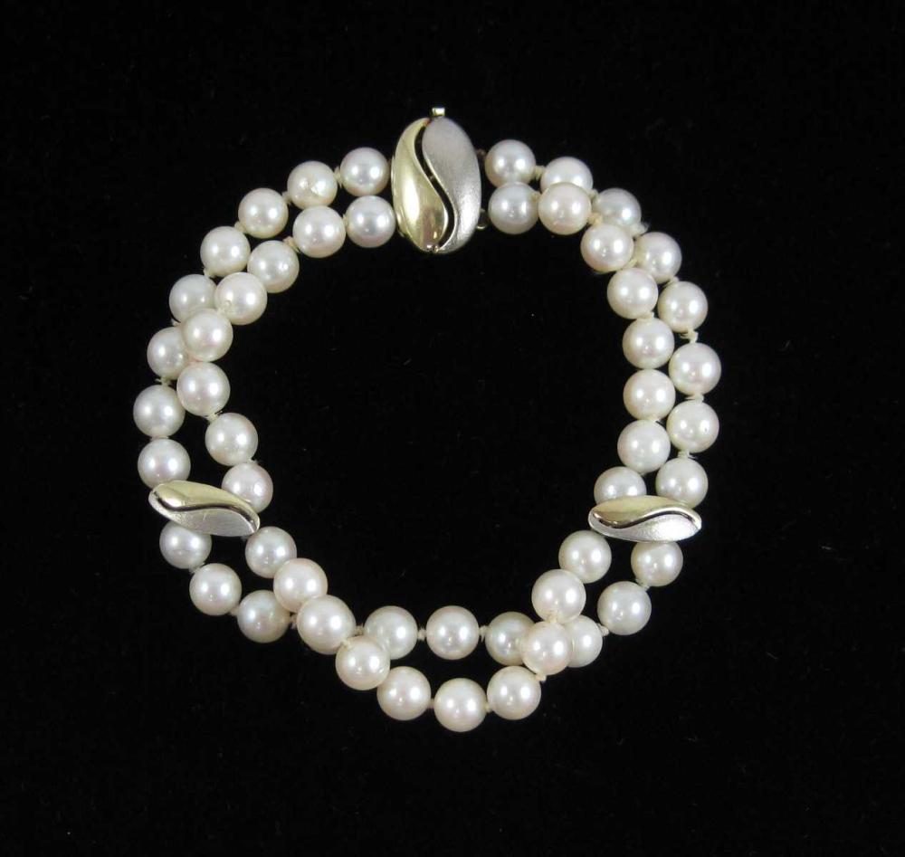 DOUBLE STRAND PEARL AND FOURTEEN