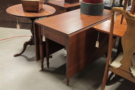 DROP LEAF TABLE. Walnut having a