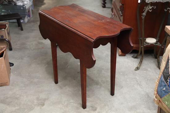 DROP LEAF TABLE. Walnut with shaped